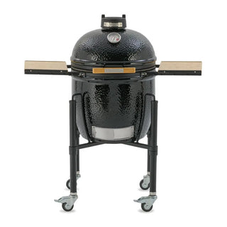 Monolith ONE 55cm Black ceramic grill on wheels with wooden side tables front view on a white background