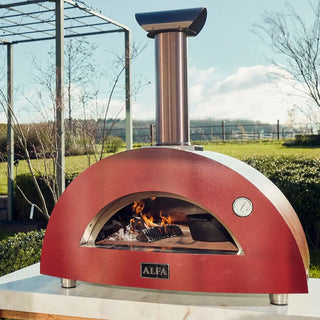 Alfa Moderno 3 Pizze Wood Fired Pizza Oven in Antique Red on a white background with flames inside