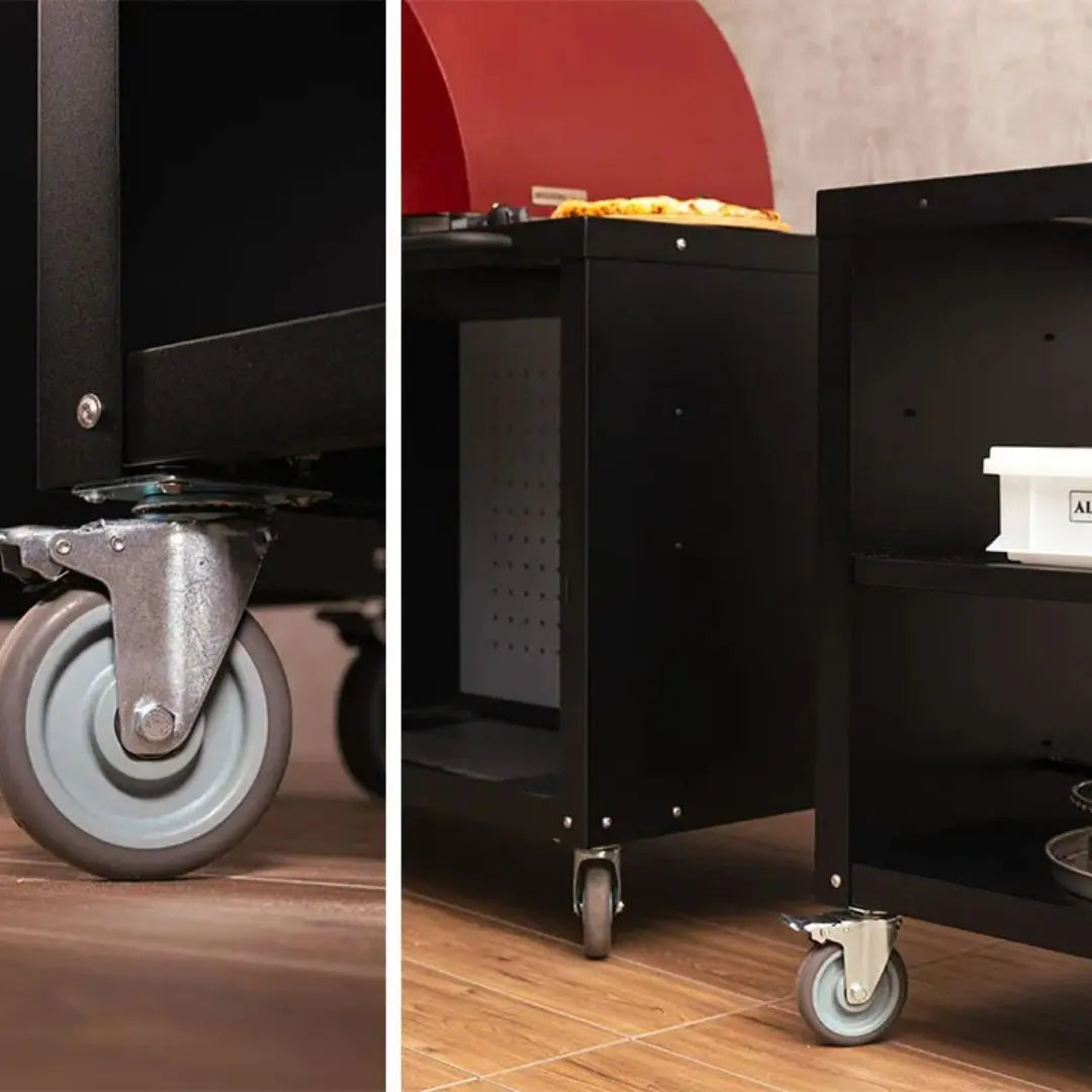 Black Alfa Pizza Oven Modular Cooking Station 160 with wheels on a wooden floor