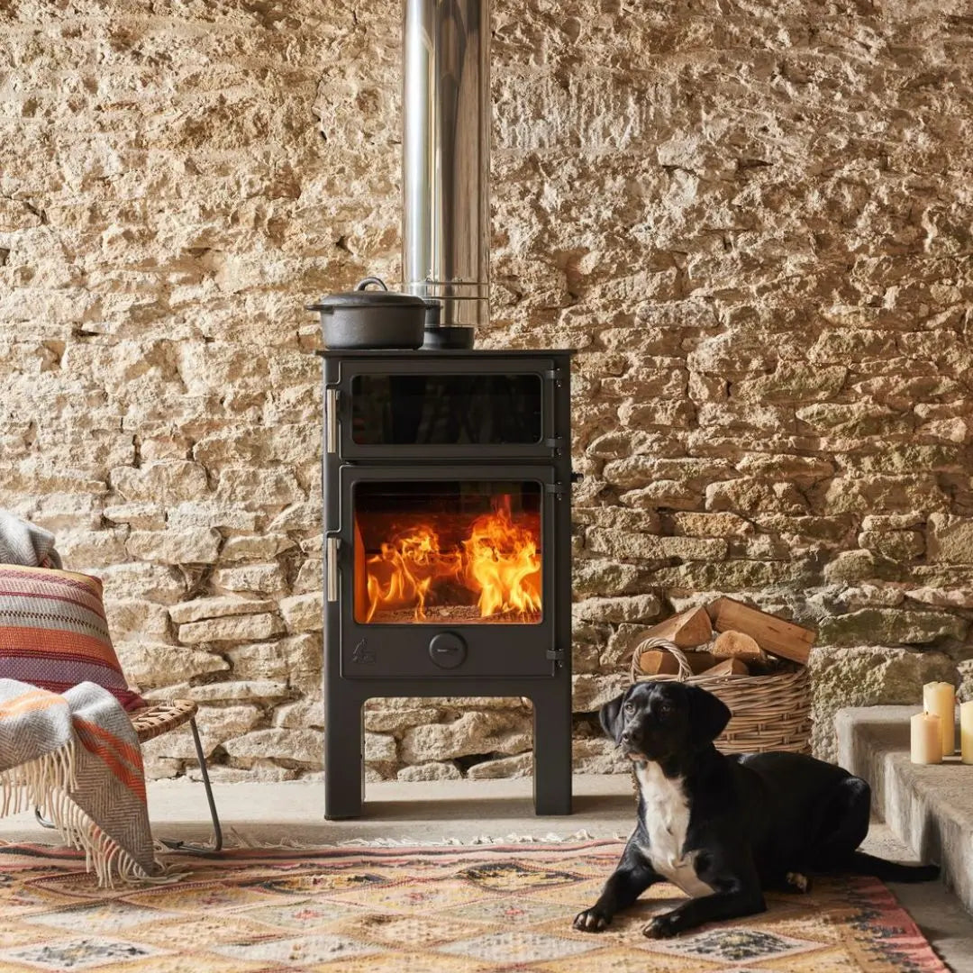 Dean Forge Baker W5 Eco High Baking Stove - 5kW with pot on top of stove and dog laying beside