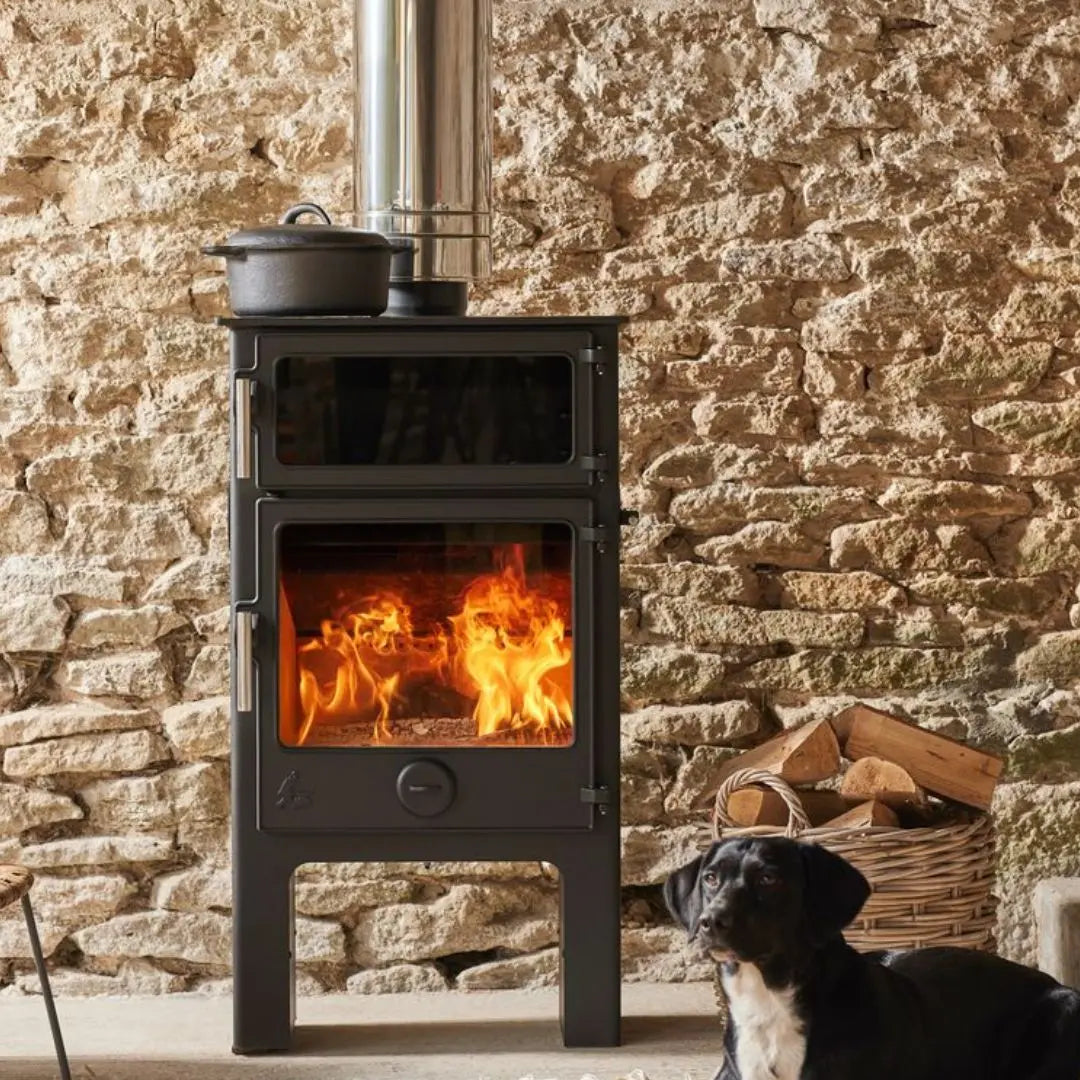 Dean Forge Baker W5 Eco High Baking Stove - 5kW with pot on top of stove and dog laying beside