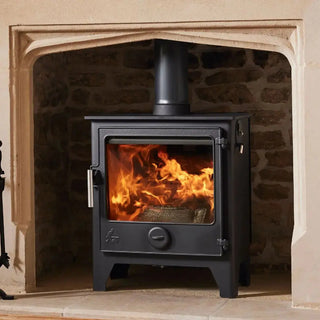 Dean Forge Dartmoor W5 Eco Stove - 5kW in fireplace setting with stainless steel handle closeup