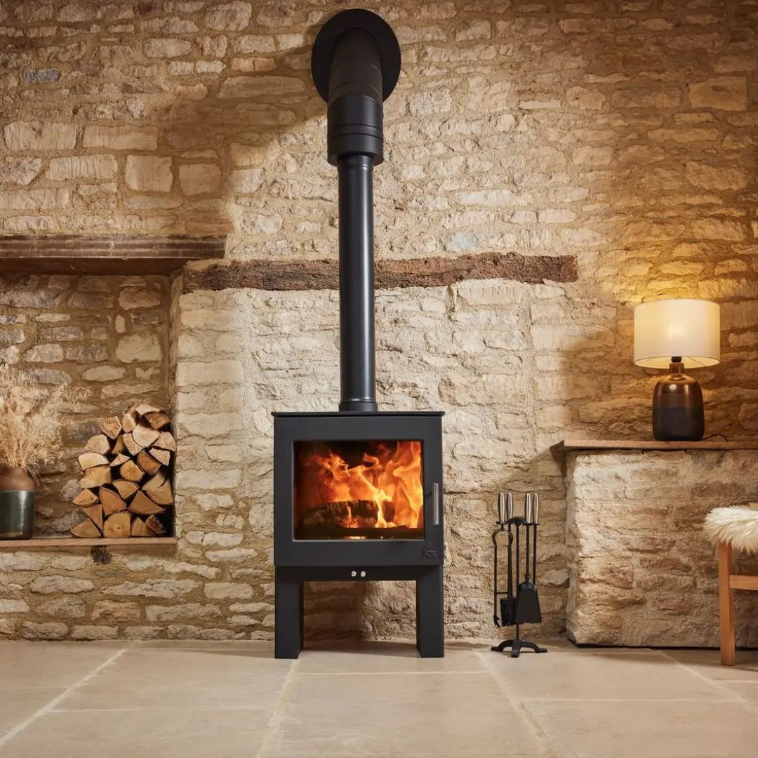 Dean Forge Sherford Slimline 5 High Eco Stove - 5kW against stone wall with flue