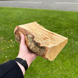 Kiln dried ash firewood bulk bag - ash log closeup