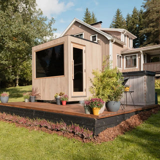 Kirami Finvision Zero Medium Sauna Solar Oak in use in a garden