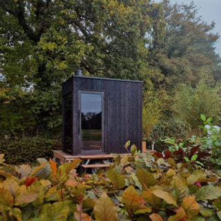 Kirami FinVision® Misty Small Sauna and Trailer in garden area