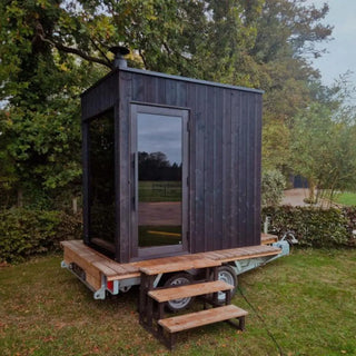 Kirami FinVision® Misty Small Sauna and Trailer in garden area