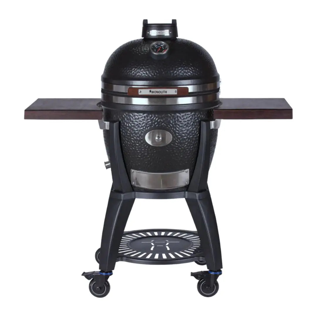 Monolith Avantgarde 55cm Black Kamado grill with cart on a white background