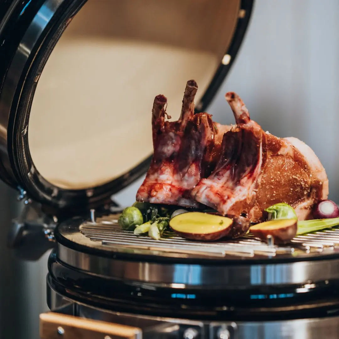 Grilled rack of lamb on Monolith ICON 53cm barbecue kamado grill with vegetables
