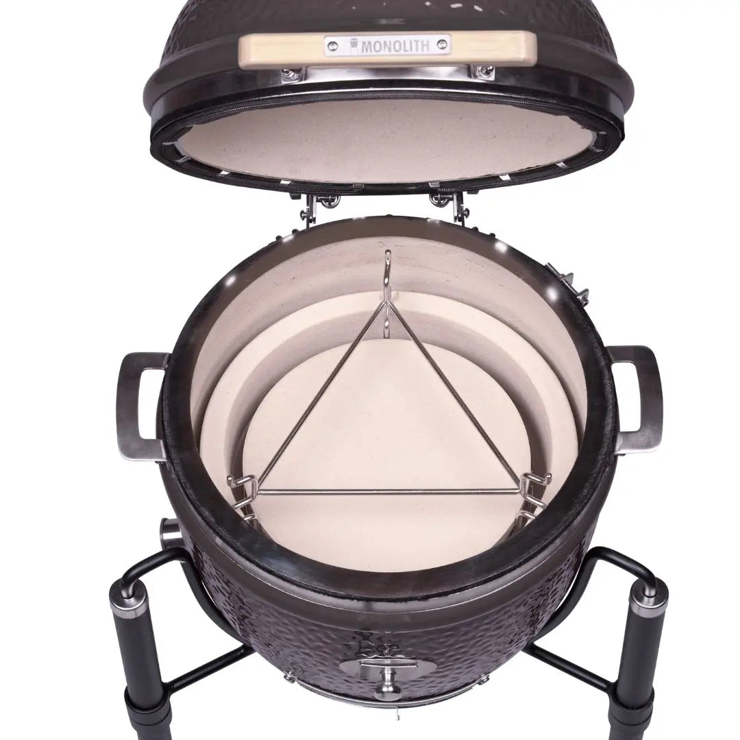 Monolith JUNIOR 2.0 47cm Black Kamado grill on cart on a white background