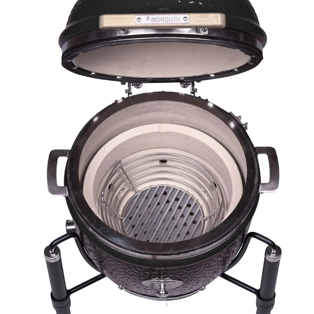 Monolith JUNIOR 2.0 47cm Black Kamado grill on cart on a white background