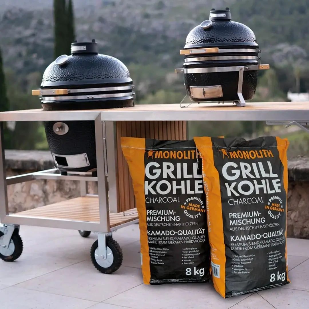 Monolith Kamado Grill Charcoal 8kg Bag in front of trolley cart set up