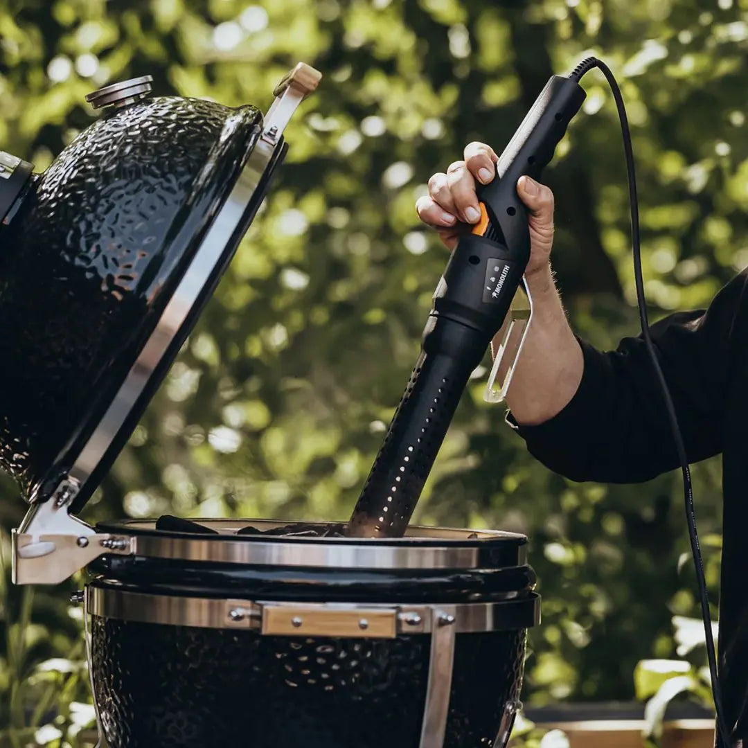 Monolith Kamado Grill Mono-lighter being used in kamado grill