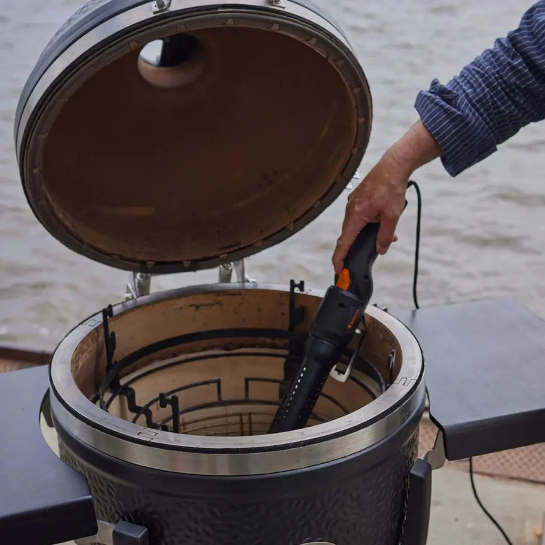 Monolith Kamado Grill Mono-lighter being used in kamado grill