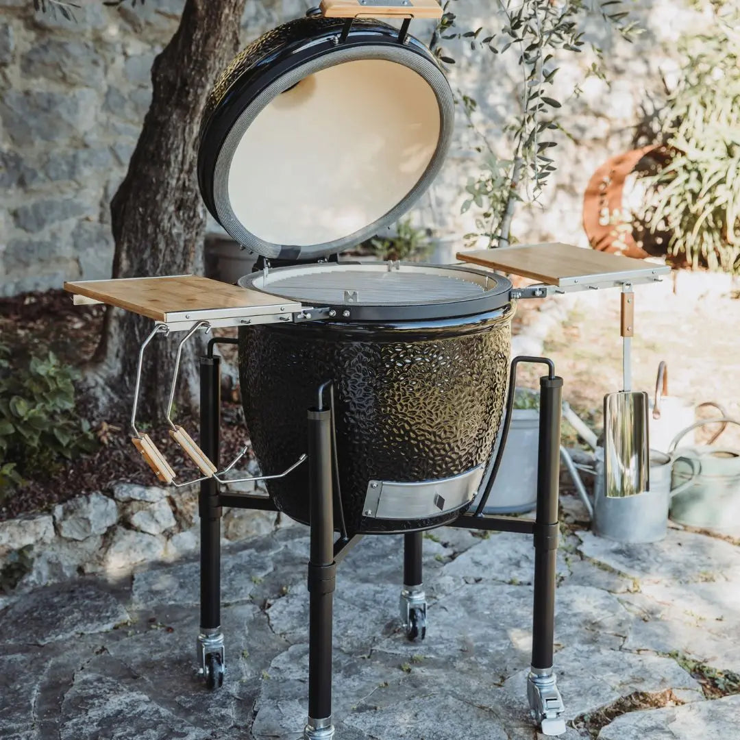 Monolith ONE 55cm Black ceramic kamado grill on patio