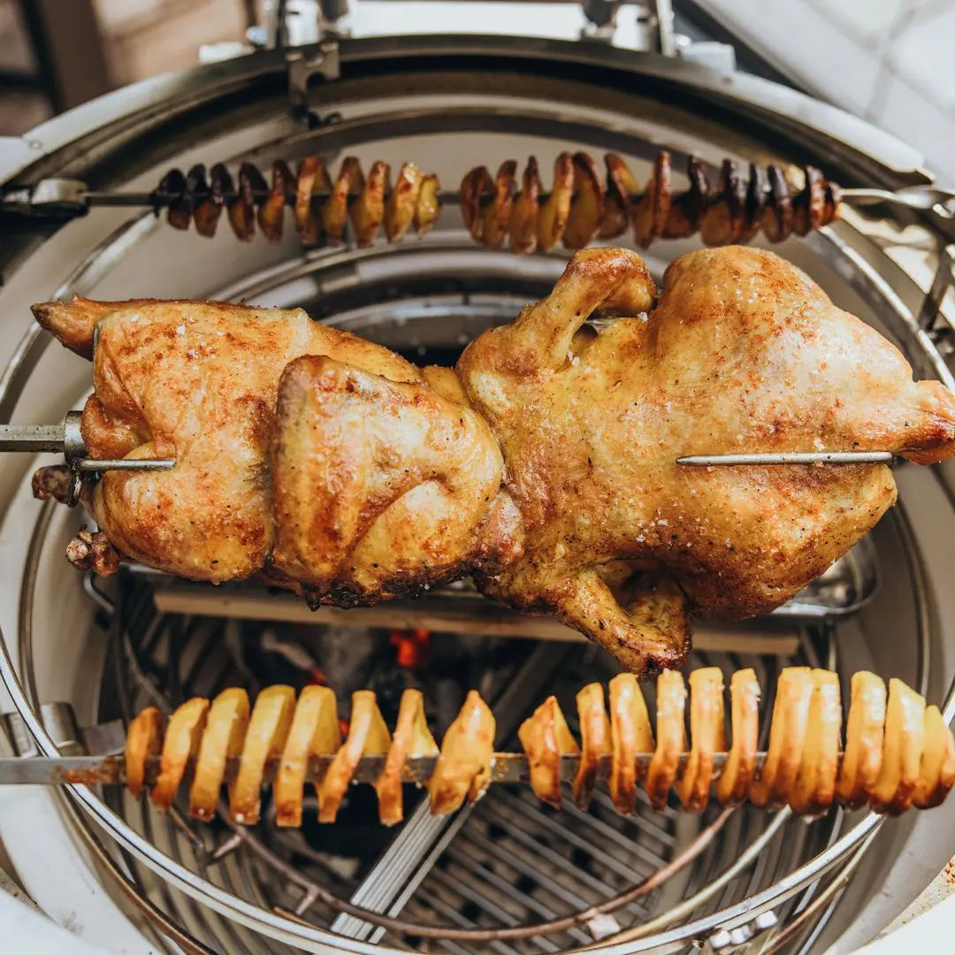 Monolith Kamado Grill Rotisserie closeup chicken roasting