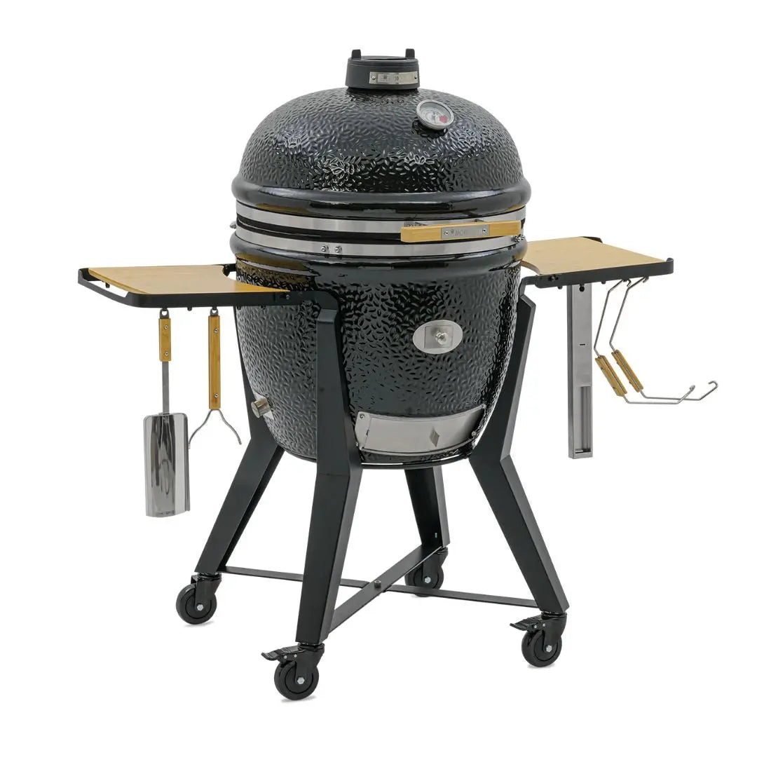 Monolith TWO 66cm Black kamado grill with cart and accessories on white background