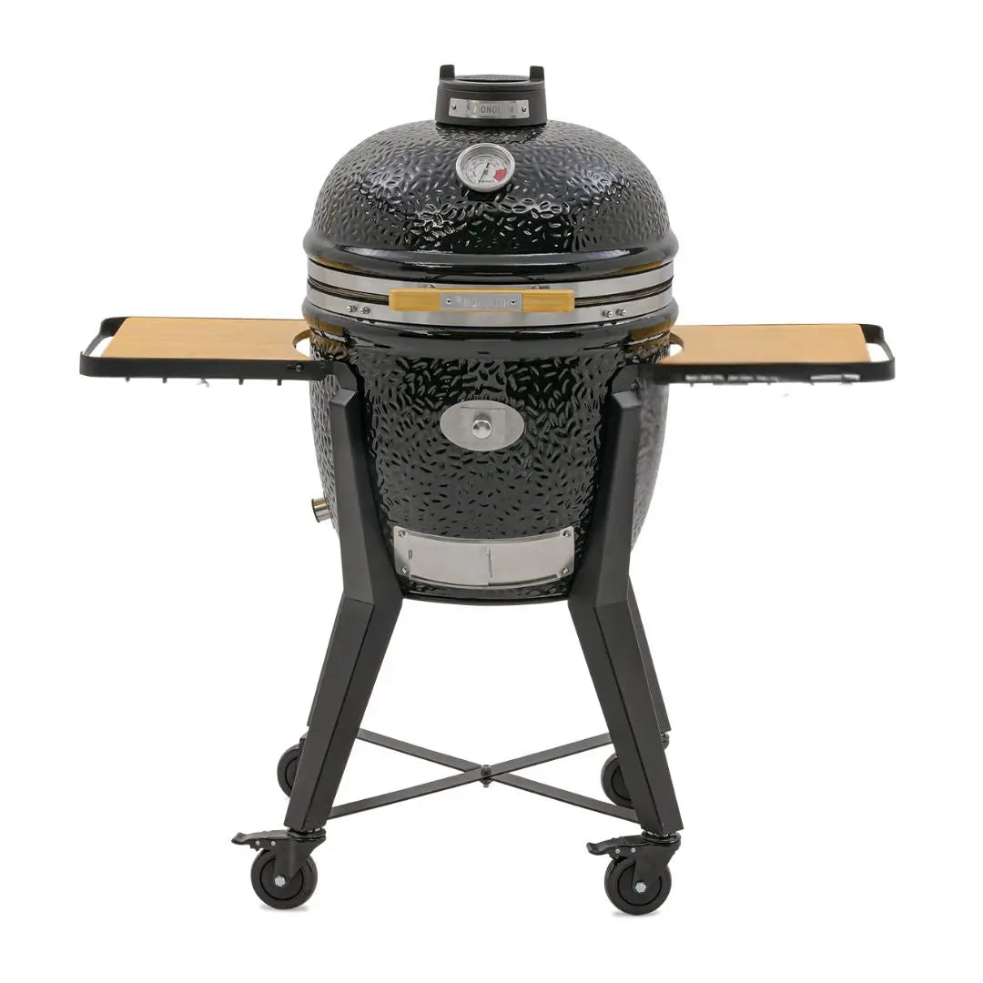 Monolith TWO.55 Kamado BBQ Grill with cart and side tables on white background