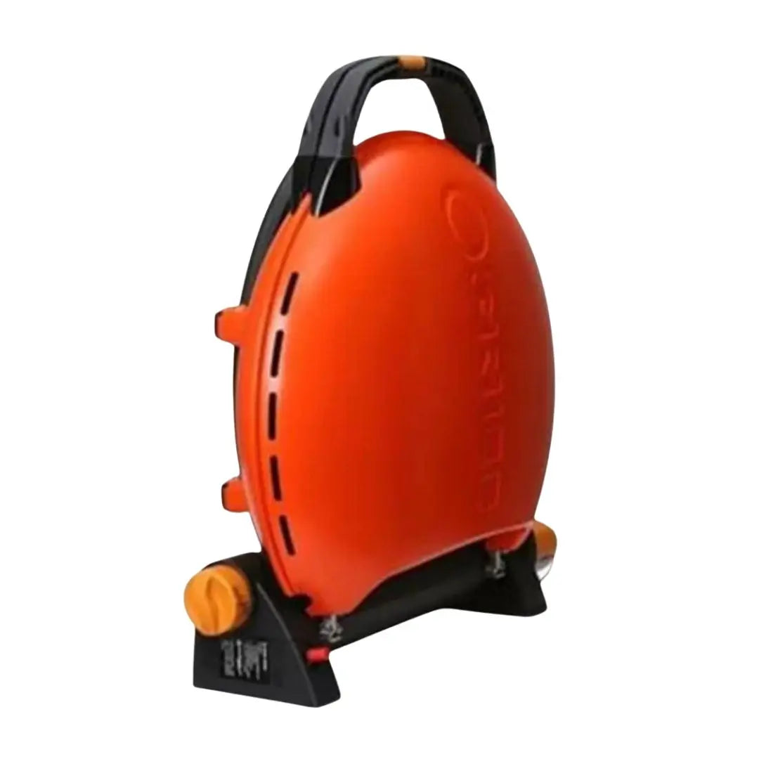 Orange and black O-Grill portable gas bbq on a white background