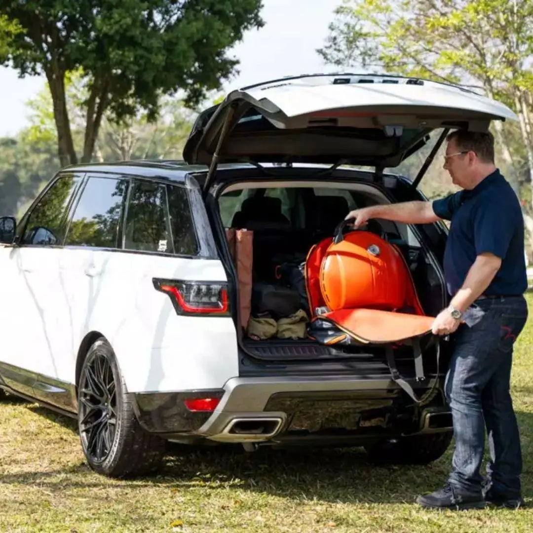 O-Grill 900 Orange Portable Gas Grill BBQ Storing in Car