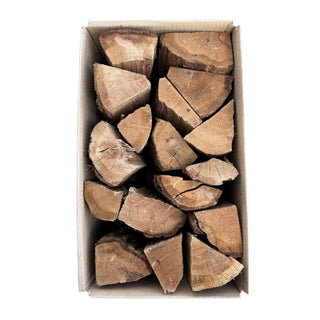 Box of oak kiln dried cooking logs for pizza oven on a white background