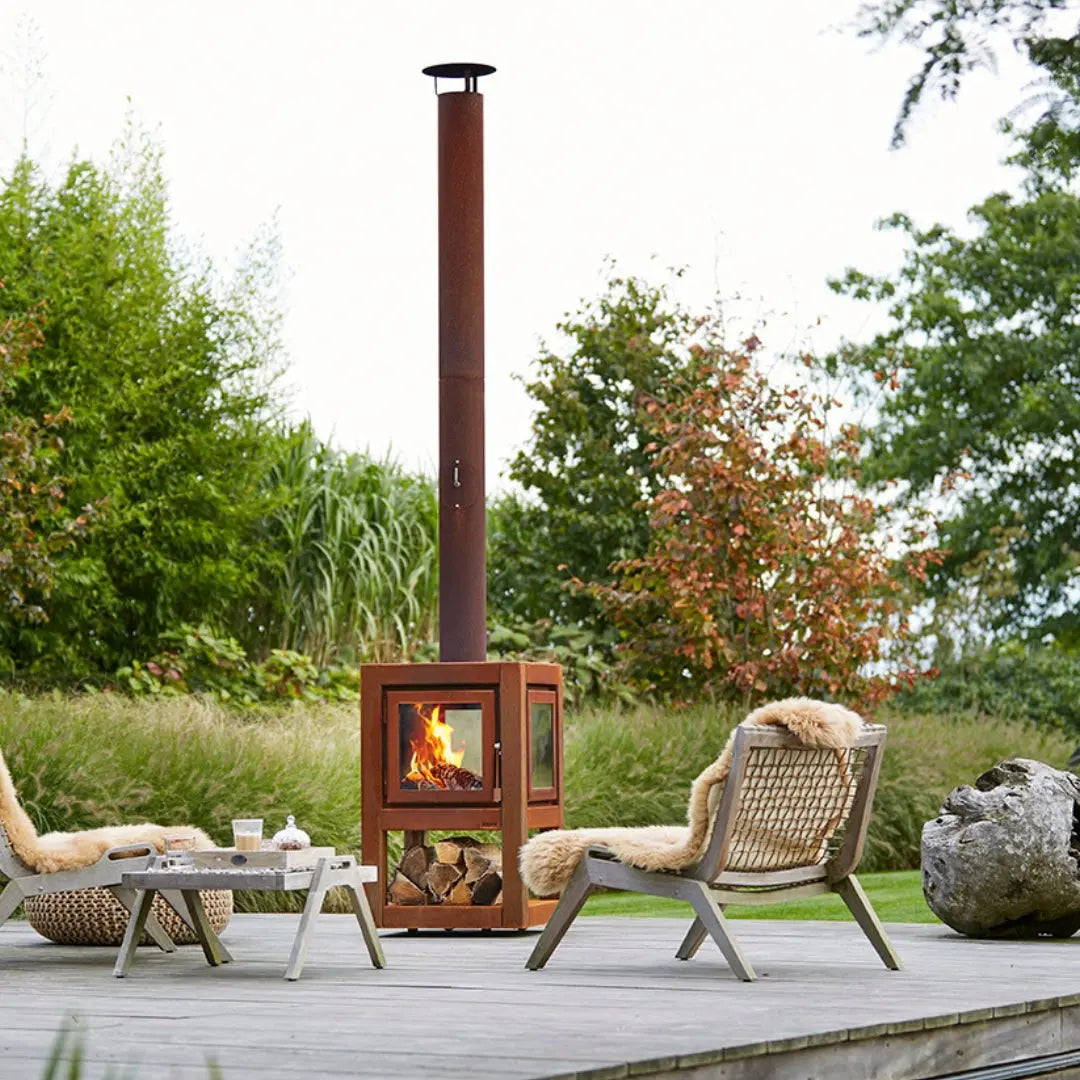 RB73 Quaruba L Mobile Outdoor Fireplace – CorTen Steel Wood Burner on outdoor patio setting