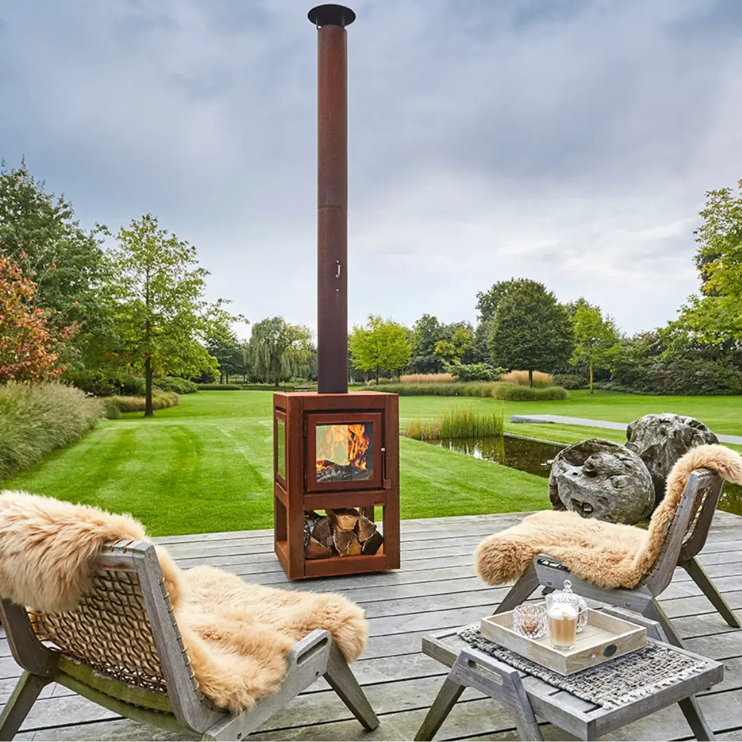 RB73 Quaruba L Mobile Outdoor Fireplace – CorTen Steel Wood Burner on outdoor patio setting