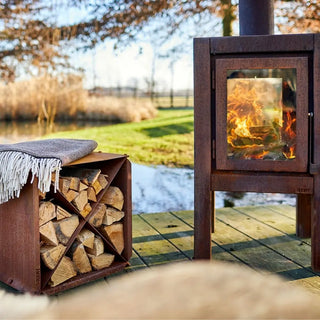 RB73 BloX CorTen Steel Log Storage Box on decking with outdoor fireplace