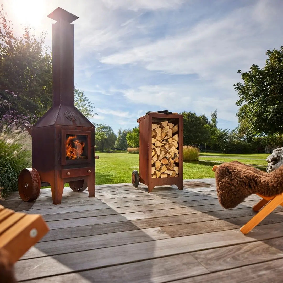 RB73 Ker Mobile CorTen Steel Log Storage on decking with RB73 outdoor fireplace