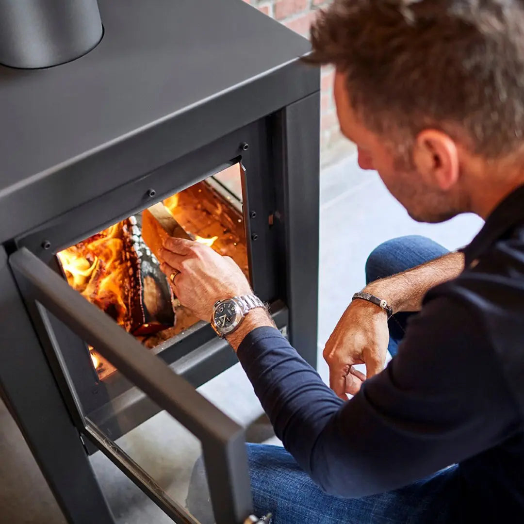 RB73 Quaruba L outdoor fireplace in black outdoor fireplace cooking outside