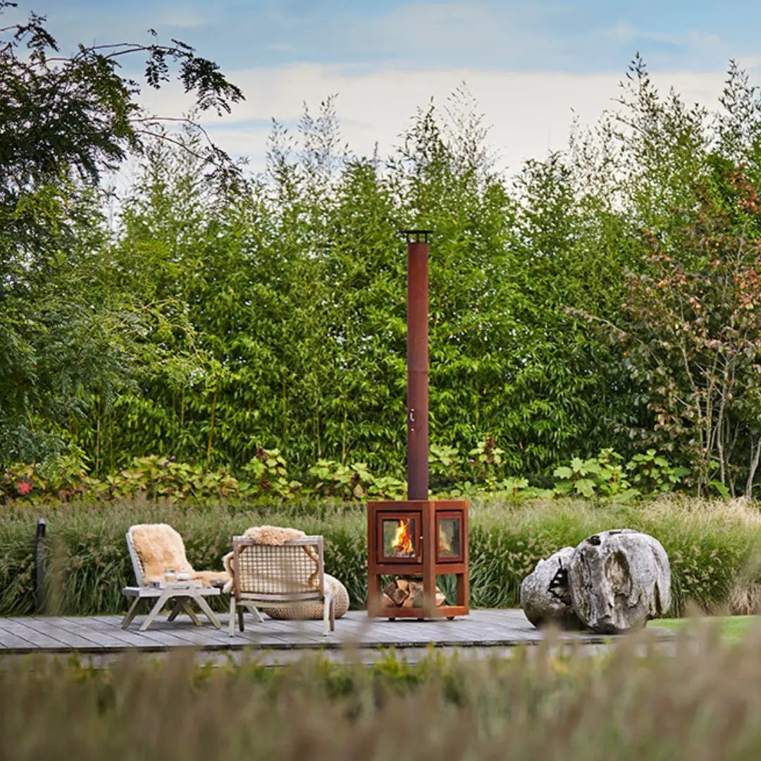 RB73 Quaruba L Mobile Outdoor Fireplace – CorTen Steel Wood Burner on outdoor patio setting