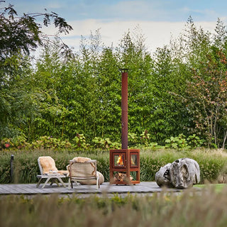 RB73 Quaruba L Mobile Outdoor Fireplace – CorTen Steel Wood Burner on outdoor patio setting