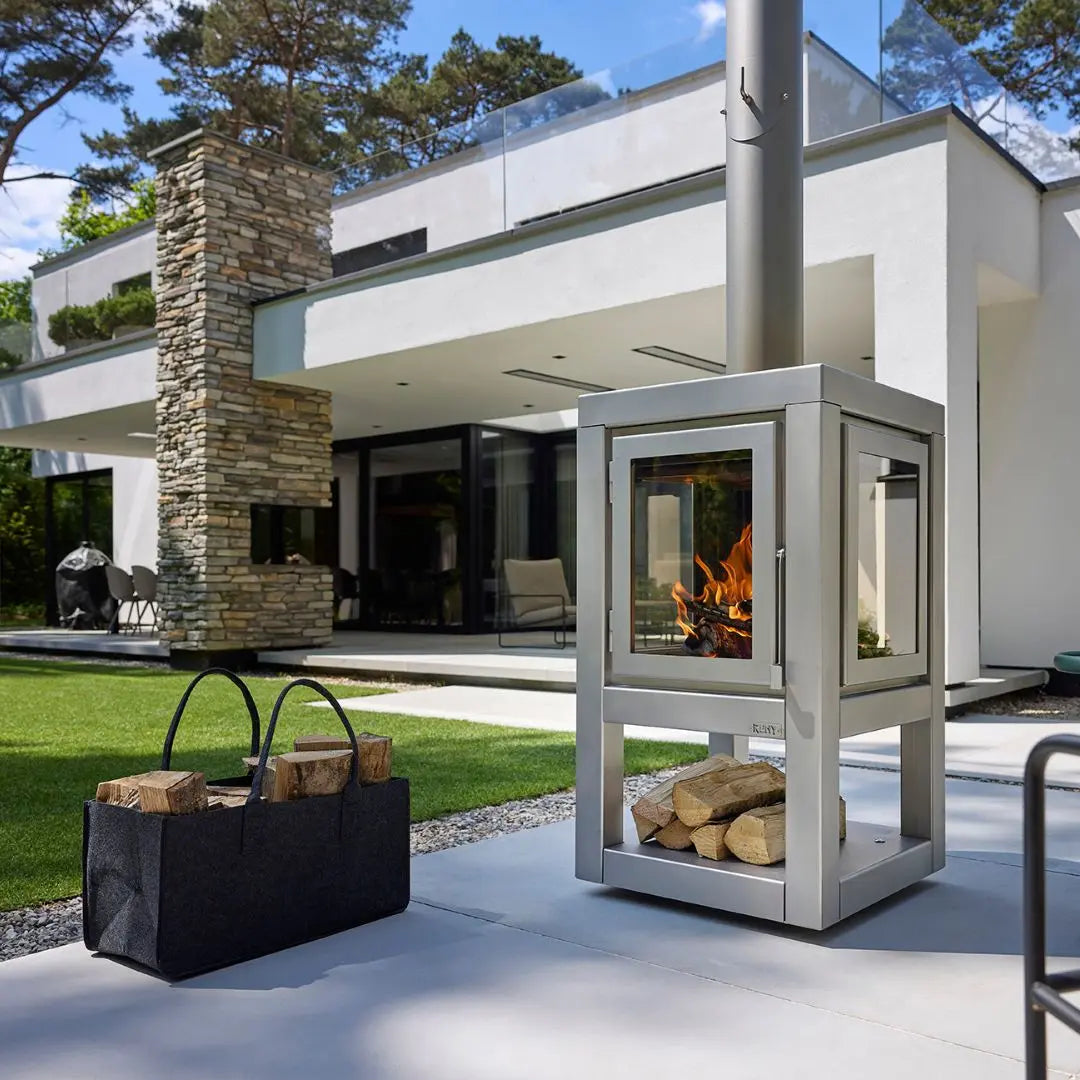 RB73 Quaruba XL Mobile outdoor fireplace in matt steel on outdoor patio setting