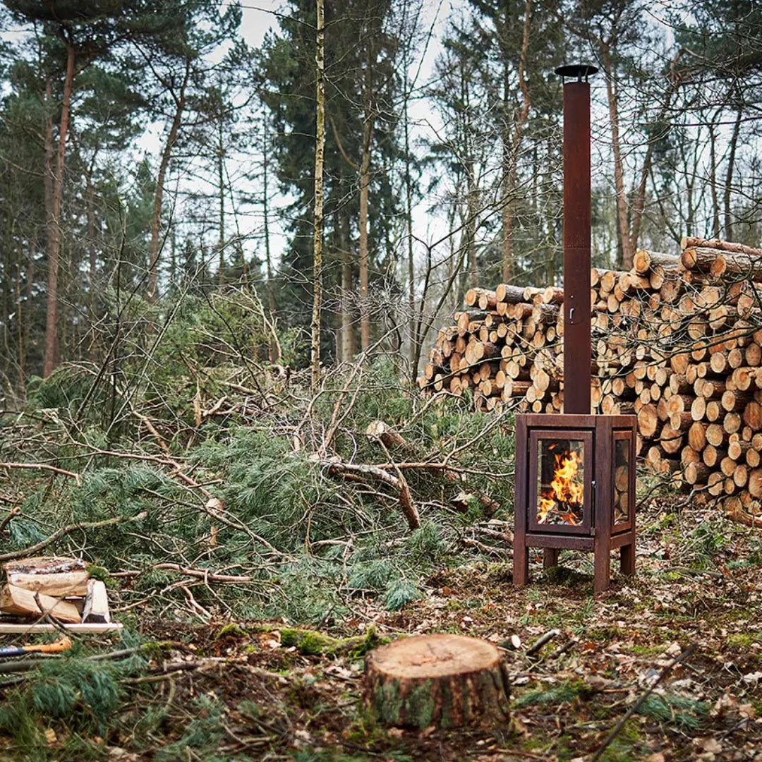 RB73 Quaruba XXL Outdoor Fireplace - CorTen Steel Wood Burner outside setting