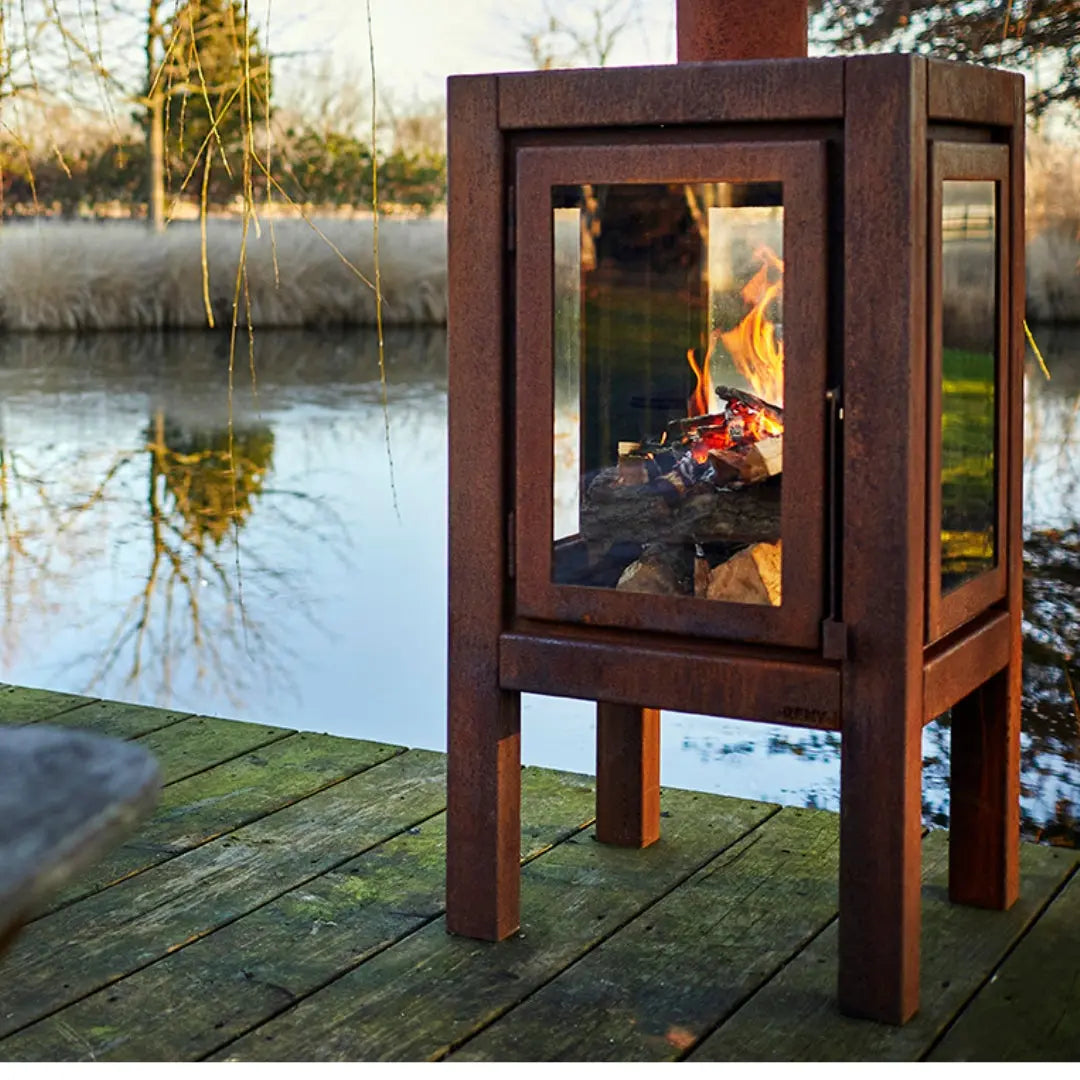RB73 Quaruba XXL Outdoor Fireplace - CorTen Steel Wood Burner on decking setting