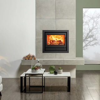 Stovax Riva2 66 Inset Wood Burning Stove - 8.1 kW on cream tiled chimney wall