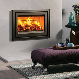 Stovax Vogue 700 Inset Wood Burning Stove - 7 kW on grey tiled chimney wall close up